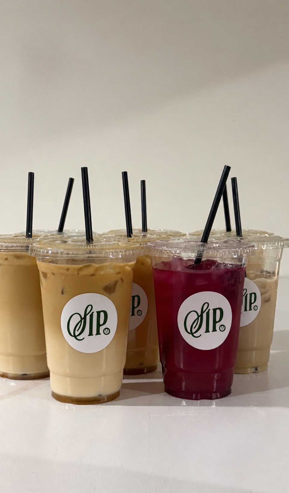 An assortment of SIP. lattes and colourful drinks ready to serve
